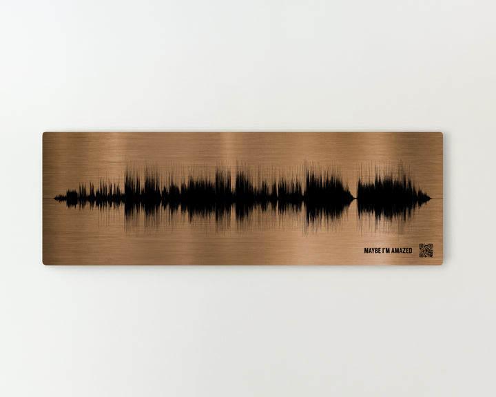 a sound wave pattern on a wooden surface.
