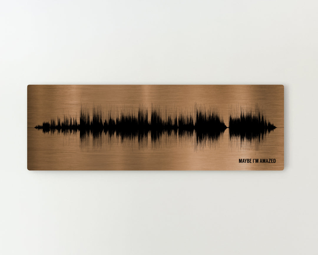 a sound wave pattern on a wooden surface.