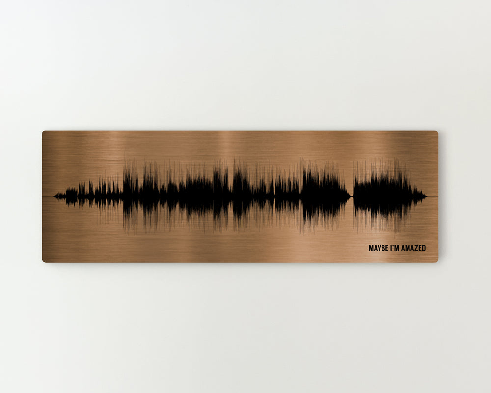 a sound wave pattern on a wooden surface.